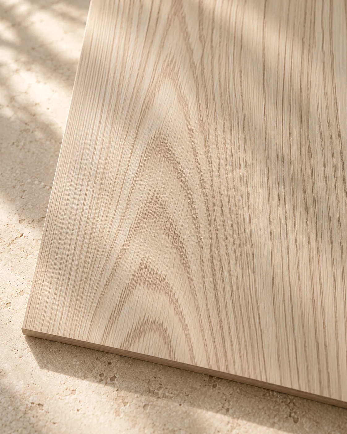 Pale ash veneer with delicate vertical grain and soft natural variation