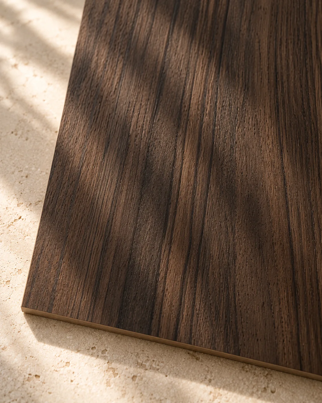 Smoked dark veneer with vertical ribbon grain in espresso and charcoal tones